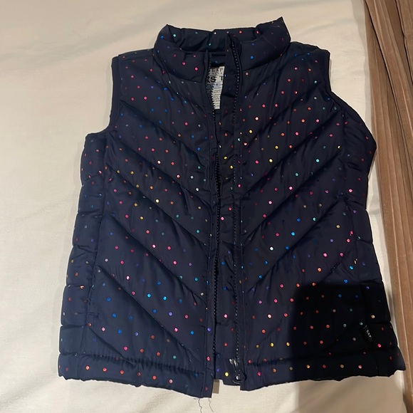 Essentially brand new puffer vest! Great quality. Metallic rainbow dots. - Picture 1 of 2